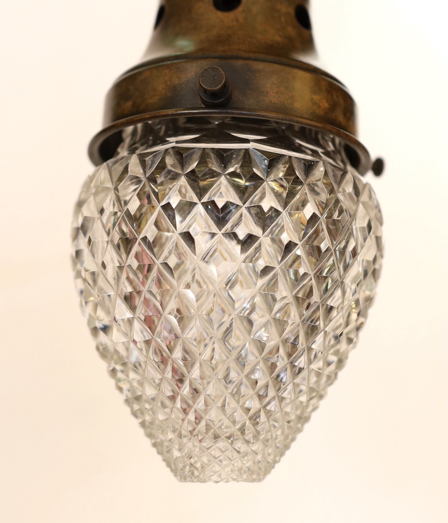 A 1920's English bronzed metal and cut glass light pendant, height 22cm